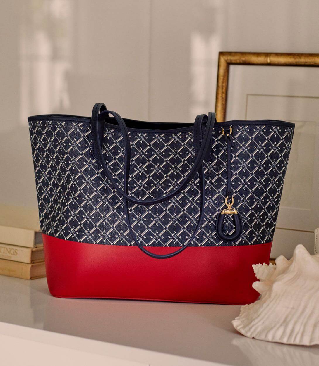 Navy print tote with red accents.