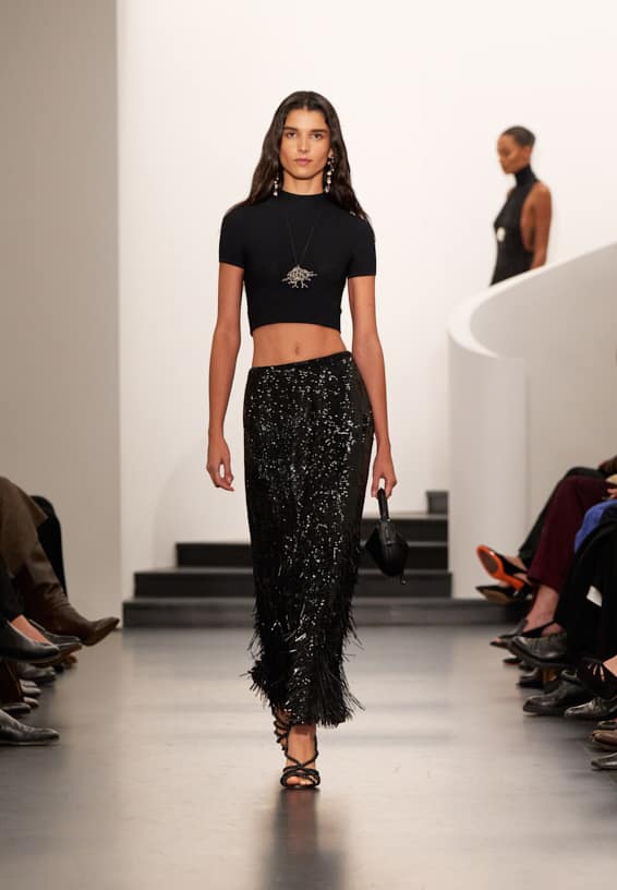 A look from Ralph Lauren’s Fall 2025 runway show shown on model.