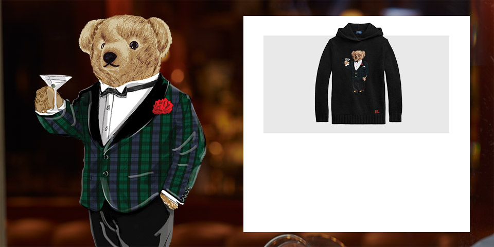 Drawing of the Polo Bear wearing plaid tuxedo jacket holding martini. Black hoodie with Martini Bear at the front.
