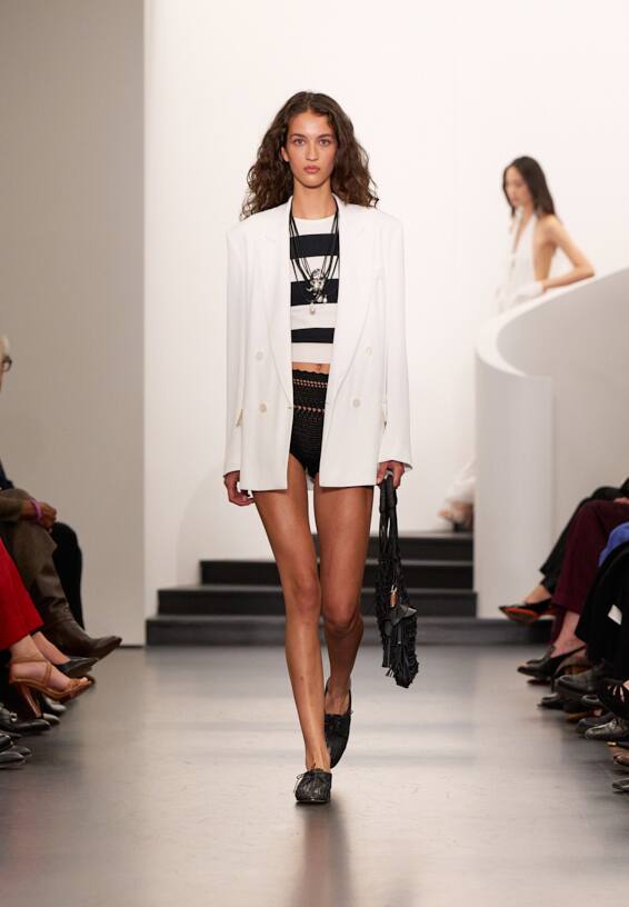 A look from Ralph Lauren’s Fall 2025 runway show shown on model.